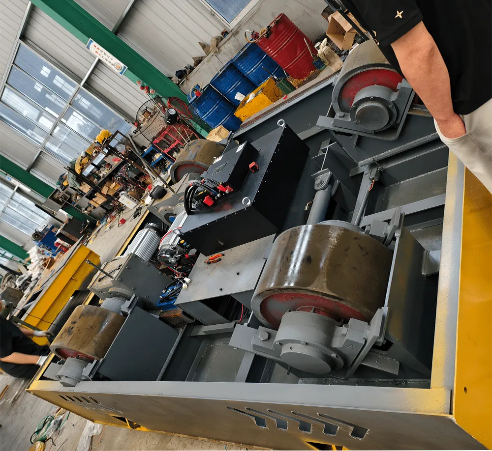 Transfer cart chassis with wheel sets and drive unit during assembly