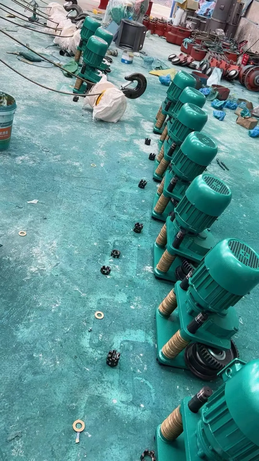 Row of hoist motors in the workshop