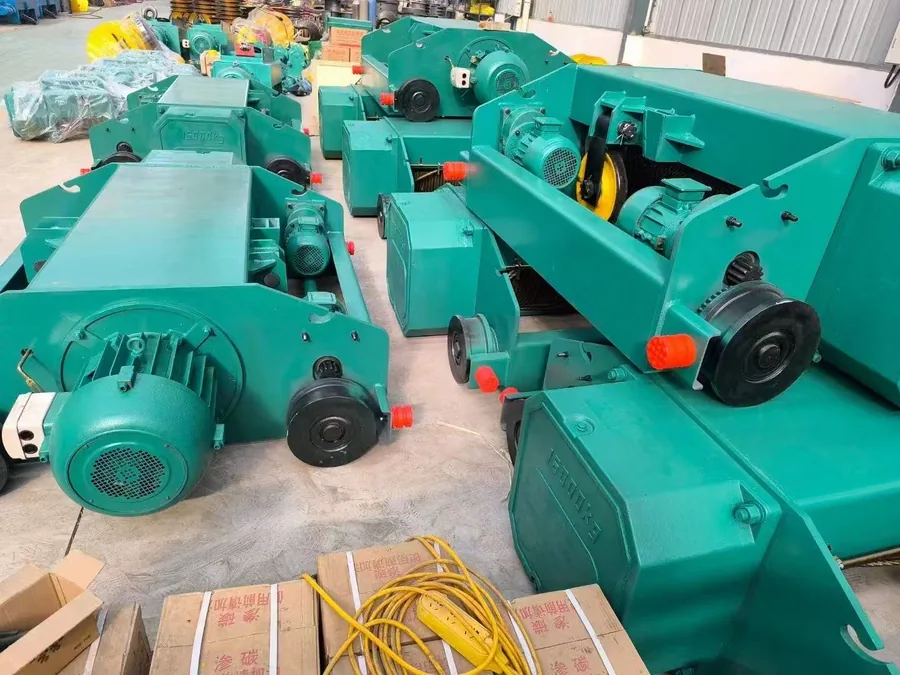 Row of CD/MD series electric wire rope hoists in the Kitanocrane workshop
