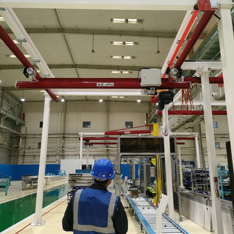 KBK modular light crane system suspended from workshop roof