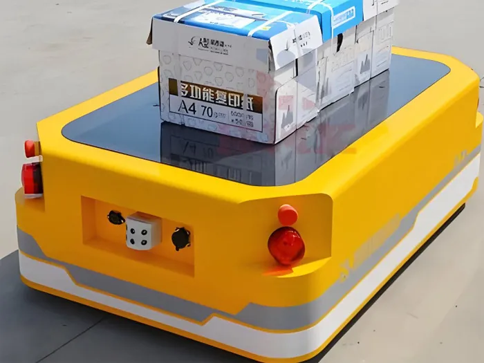 Platform AGV carrying cartons on its deck