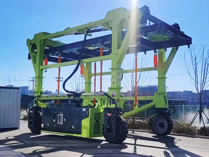 Energy storage cabinet straddle carrier unloaded, with lifting slings hanging from the top frame